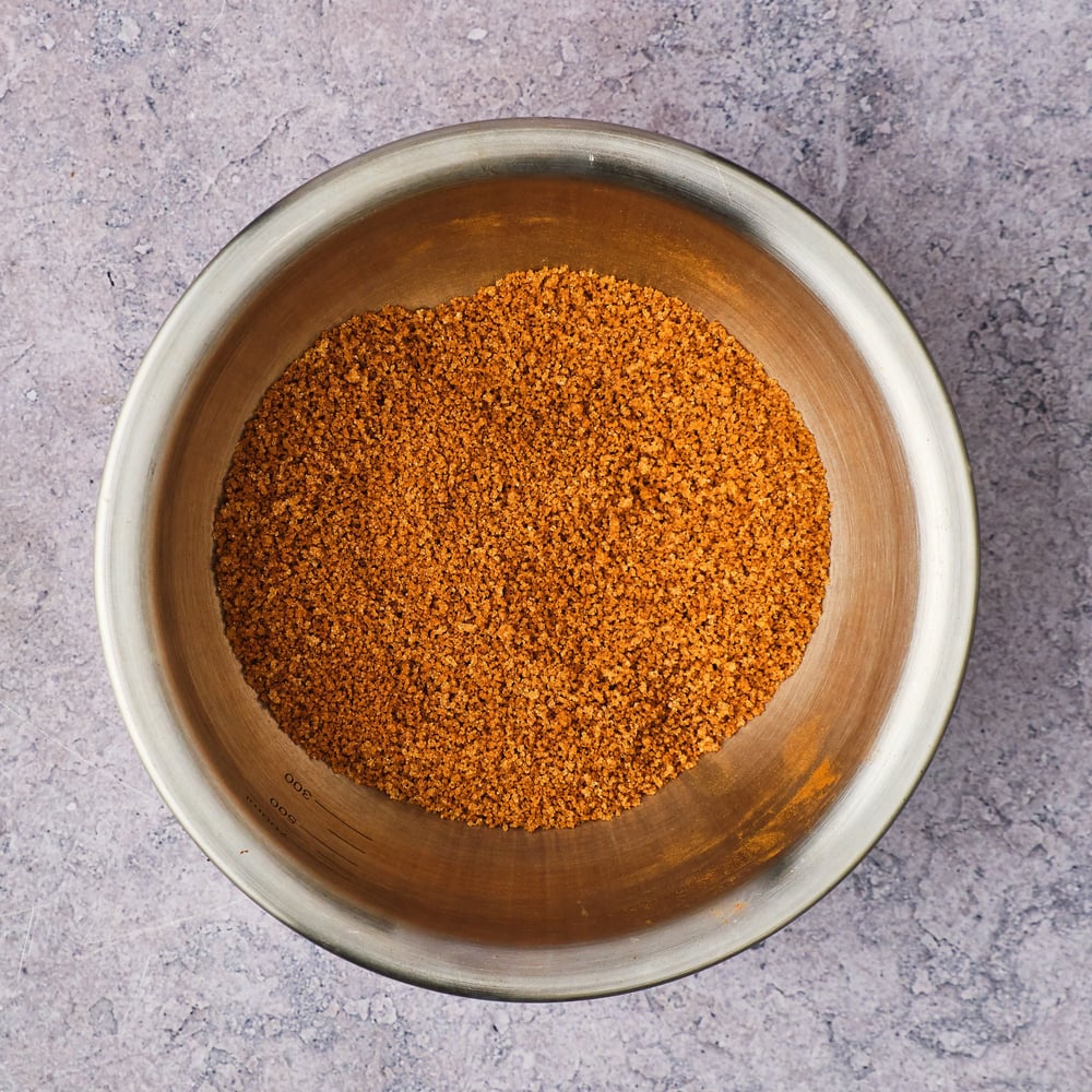 Cinnamon and brown sugar mixed together in a small mixing bowl.