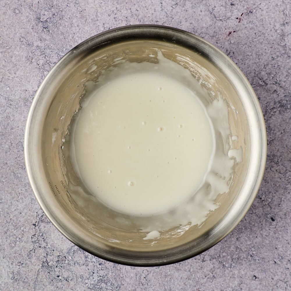 Icing for coffee cake, mixed together in a small mixing bowl.