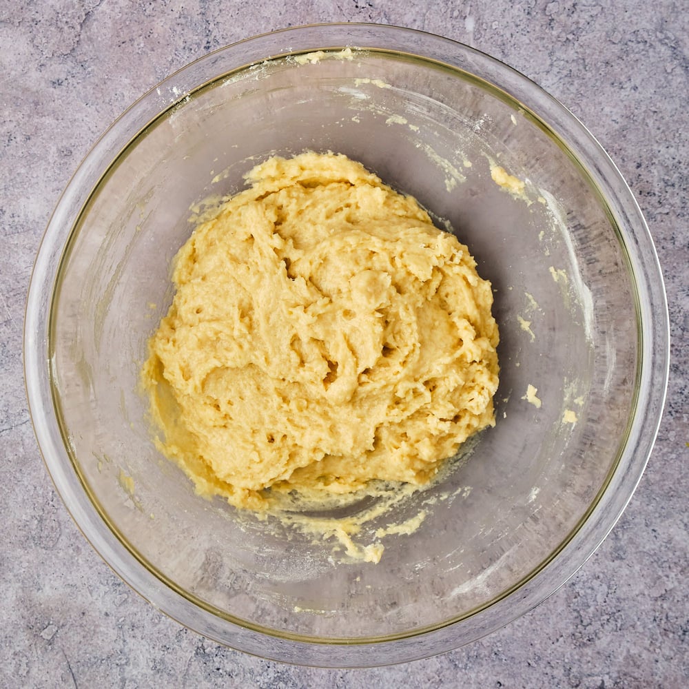 Coffee cake batter, mixed together in a large mixing bowl.