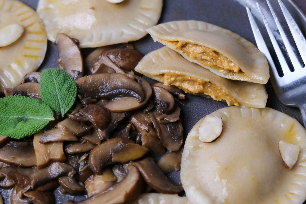 Mushrooms and sage butter pair perfectly with the slightly sweet butternut squash ravioli filling.
