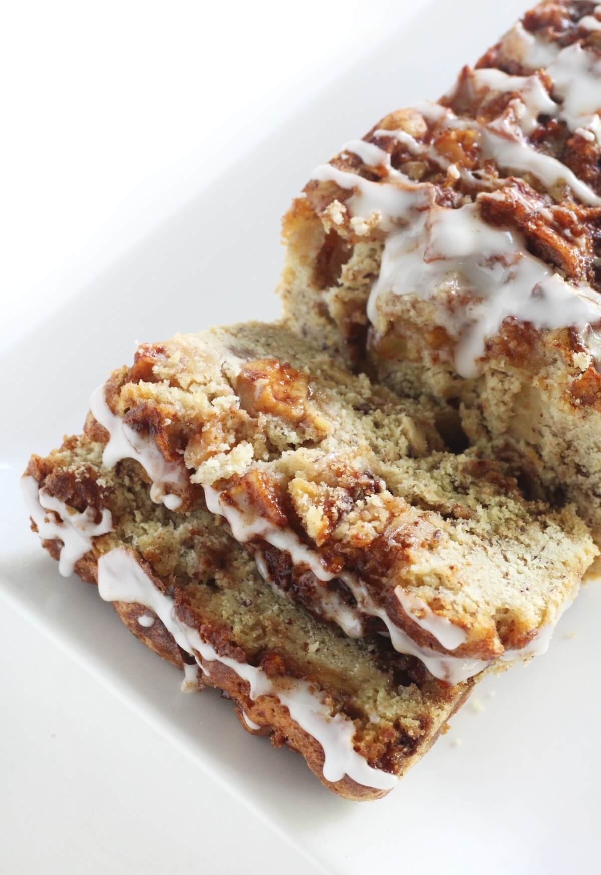 Gluten-free apple fritter bread sliced on a platter.