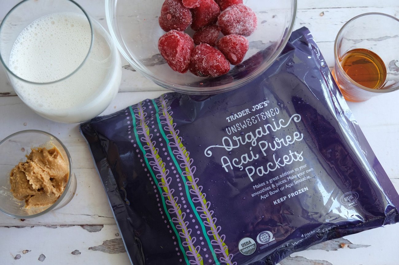 For this recipe, you'll need unsweetened açaí packets, frozen strawberries, homemade cashew milk, peanut butter, and maple syrup.
