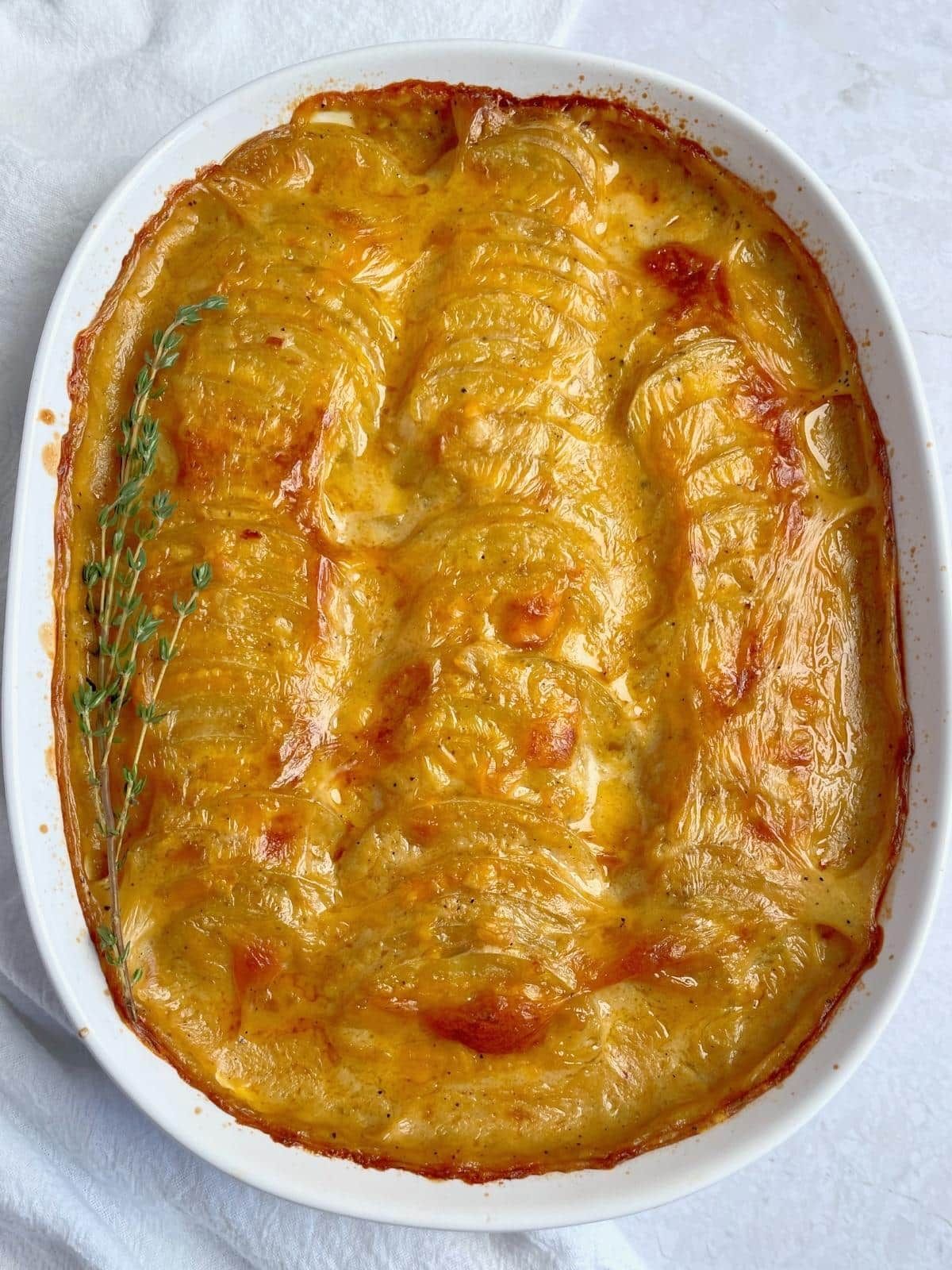 Vegan scalloped potatoes in a casserole dish. 