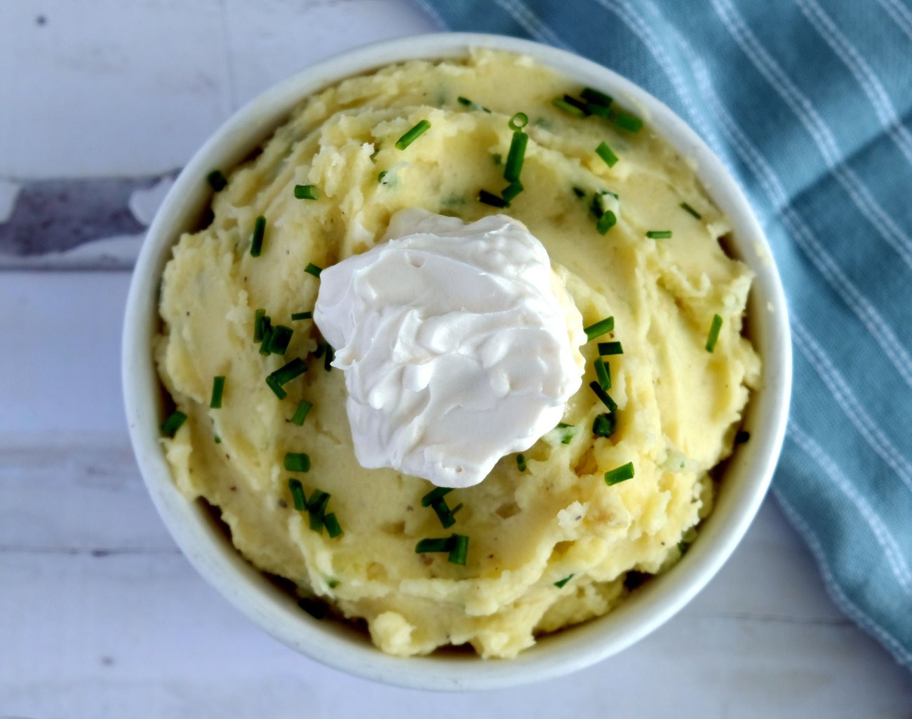 I like Kite Hill's vegan sour cream, but use any vegan sour cream that you like the flavor of in these creamy vegan mashed potatoes.