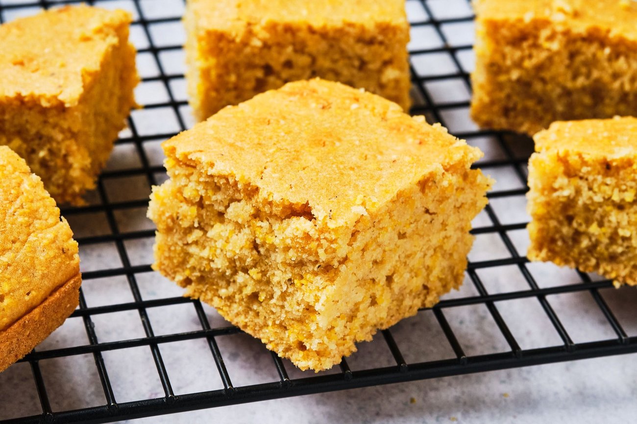 Vegan cornbread cooling on a wire rack. 