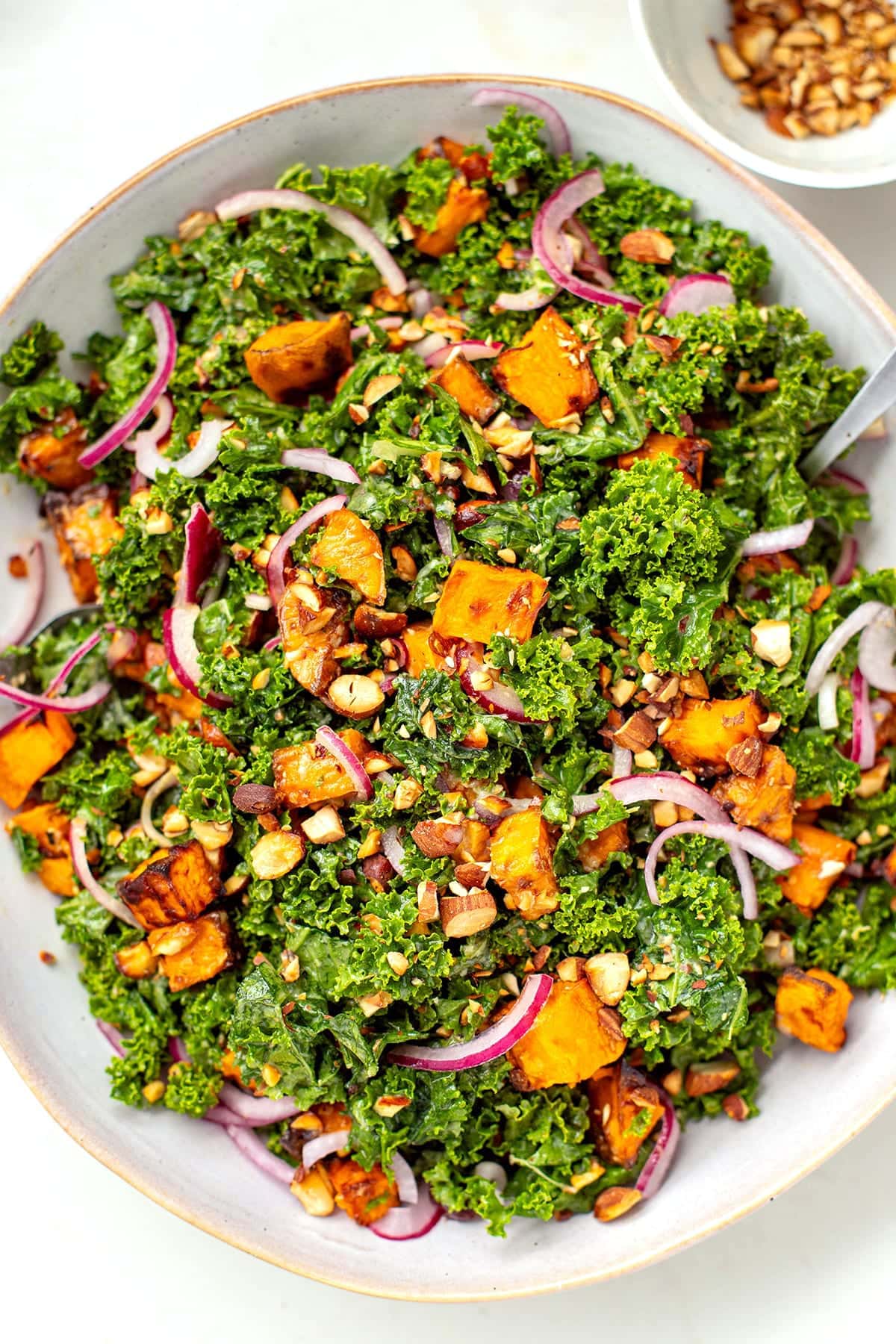 Kale and sweet potato salad in a large bowl.