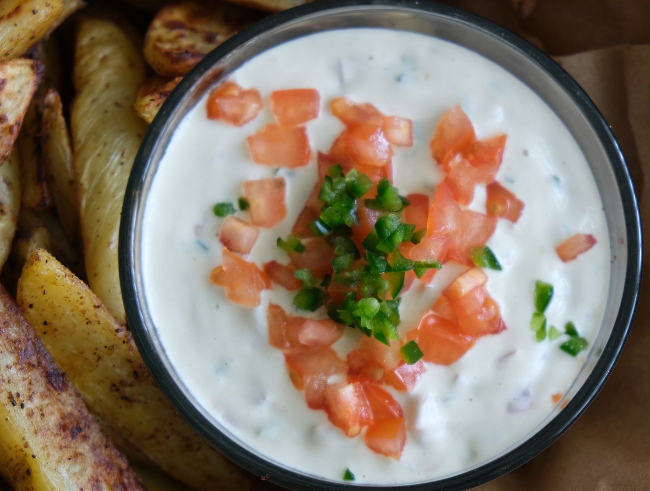 This jalapeño dip has a sour-cream-like flavor, which makes a delicious complement to warm potato wedges. 