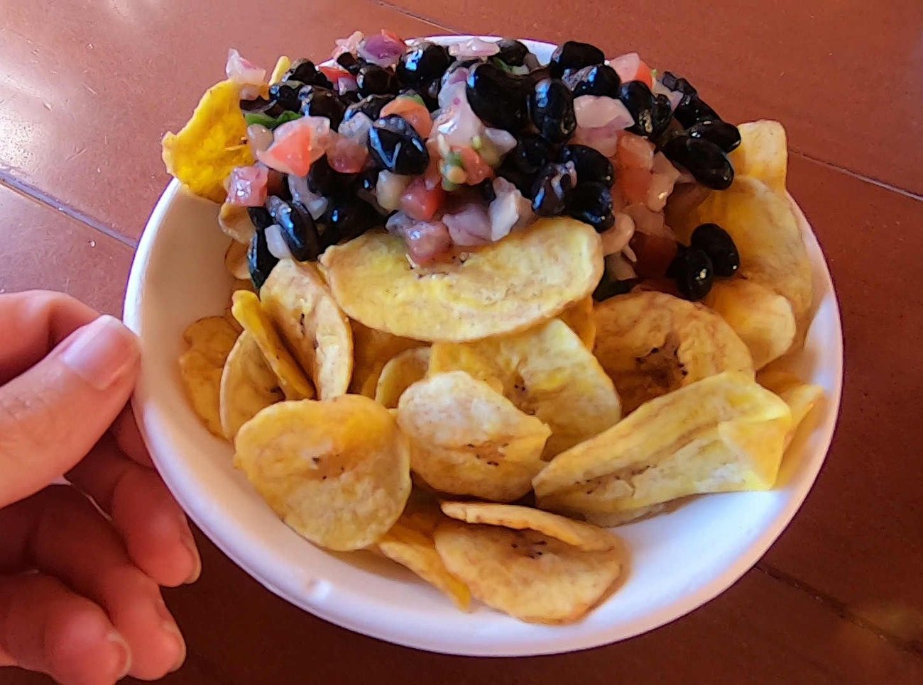 "Tostones" with black bean salsa