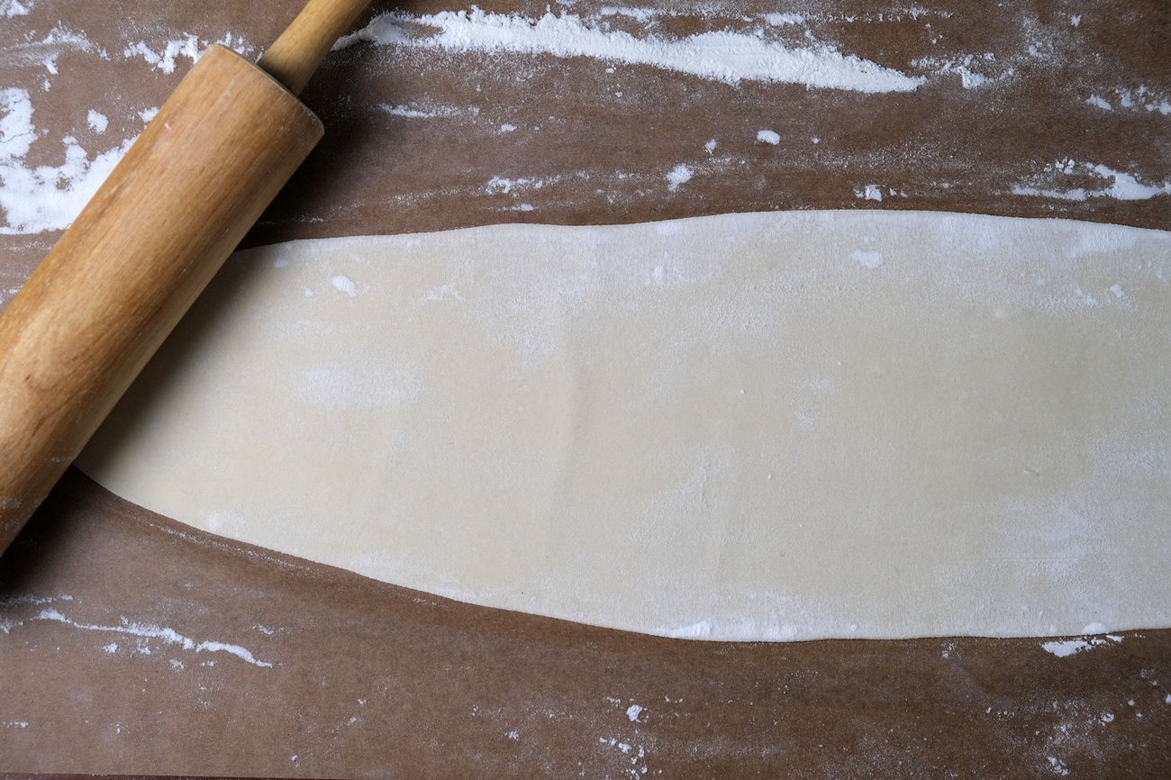 One sheet of ravioli dough, rolled out.