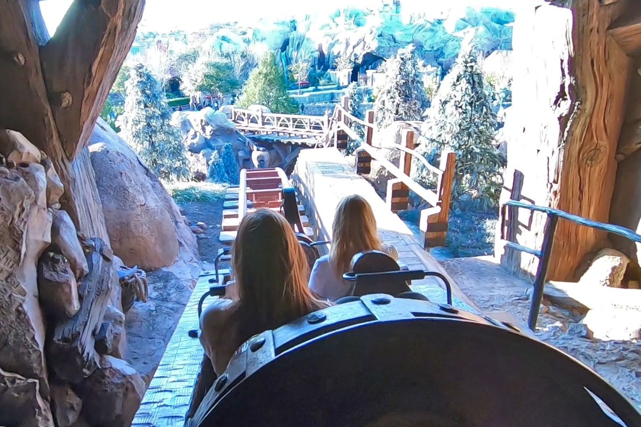 The first thing you'll see as the ride begins is the appearance of the tracks dropping off suddenly, similar to this view. In actuality, there's just a small drop ahead.