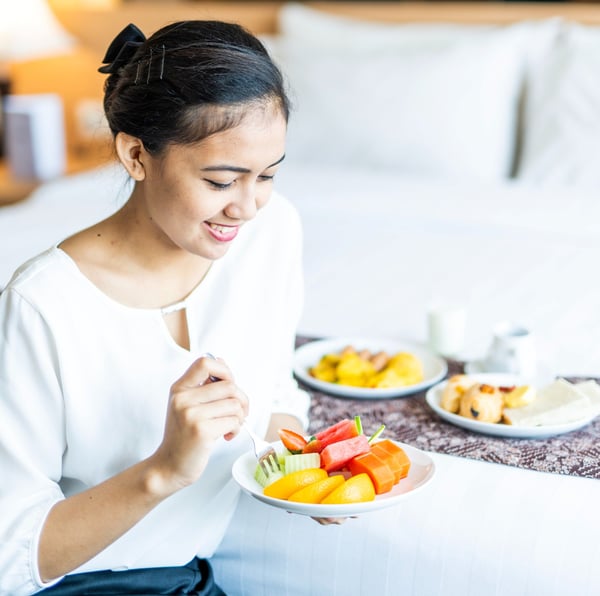 Woman eating fruits