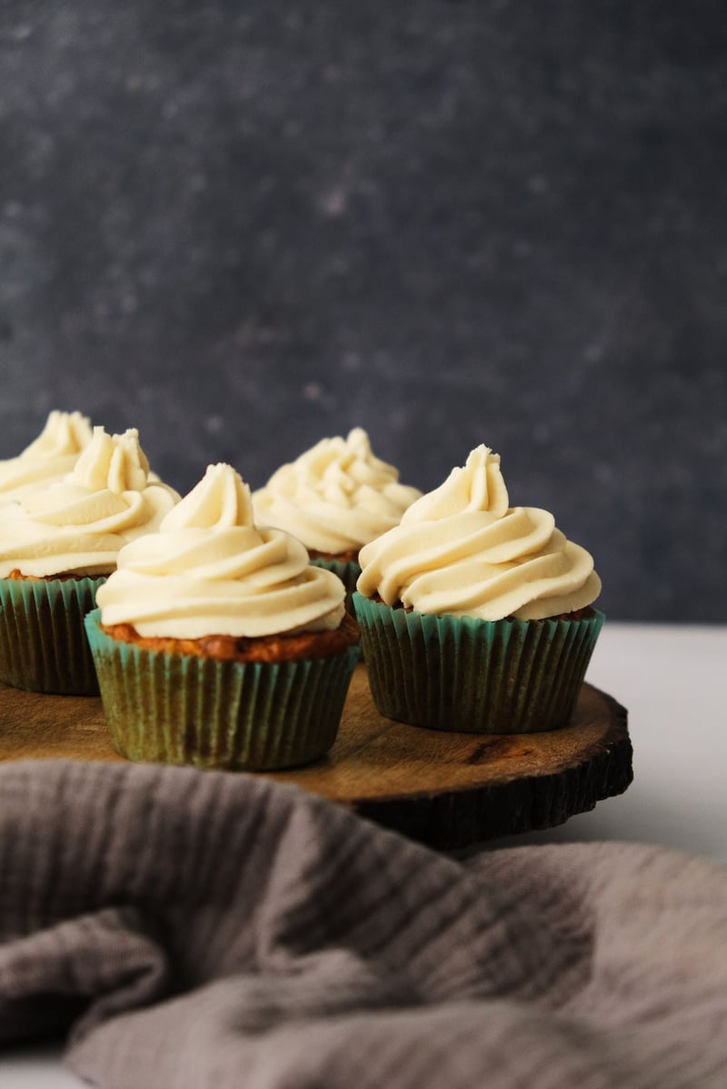 vegan cream cheese frosting on cupcakes vertical