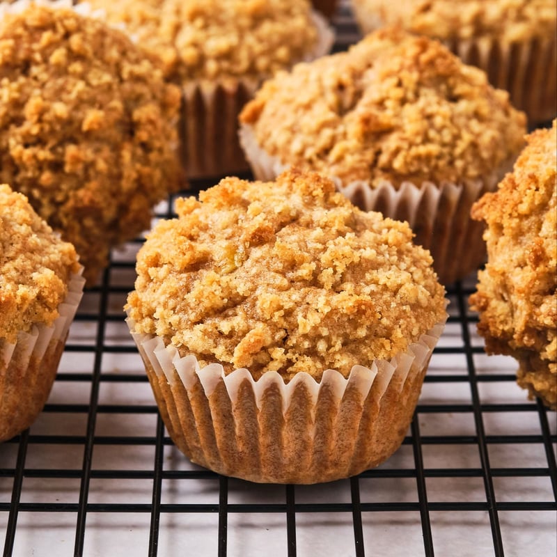 Vegan banana muffins on a cooling rack.